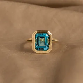 14K Yellow Gold 4.34 Carat Emerald Cut Swiss Blue Topaz Bezel Knife Edge Ring