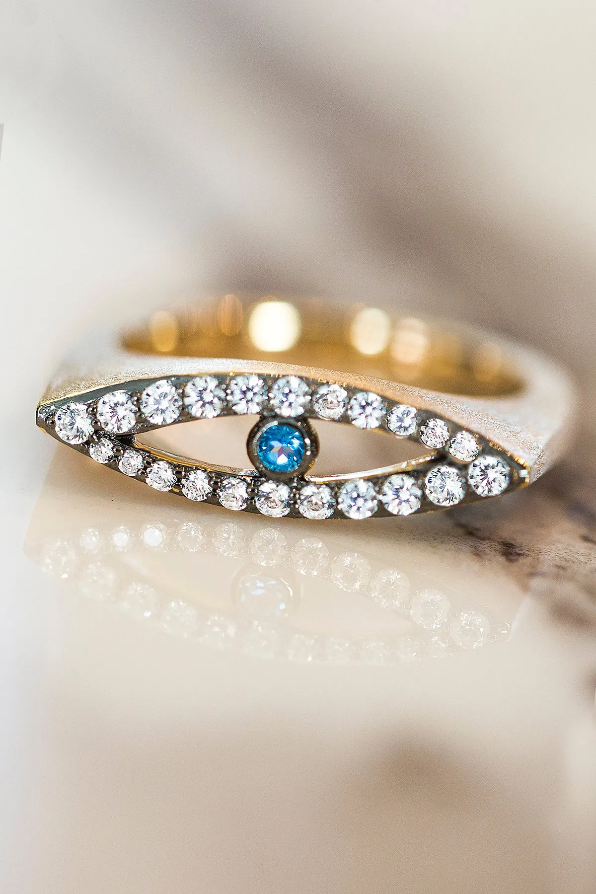 AMMANII Studded Evil Eye Ring with Blue Topaz Center in Vermeil Gold